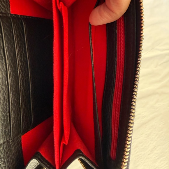 Dooney & Bourke Pebble Leather Black and Tan zip Wallet with Gold Accents - Picture 10 of 13